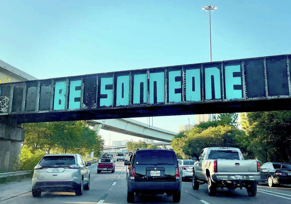 A smaller “Be Someone” was repainted overnight on the railroad bridge spanning I-45 just north of downtown Houston on Tuesday, Sept. 27, 2022.