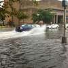 Flooding Tuesday morning along Union Avenue near Police Headquarters and Union Station in New Haven.