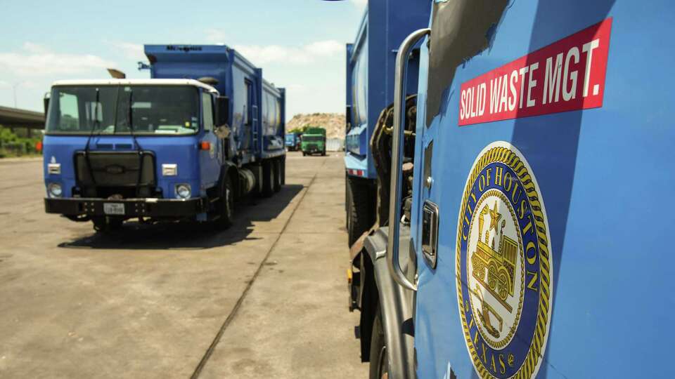 A City of Houston solid waste management truck is shown in the Southwest Service Center yard Thursday, May 19, 2022 in Houston. The department has had staffing shortages and employees often work overtime.