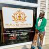 Vernatha Montoute stands in front of her studio, Peace of Royalty, during the grand opening on Sept. 25 in Walnut Beach.