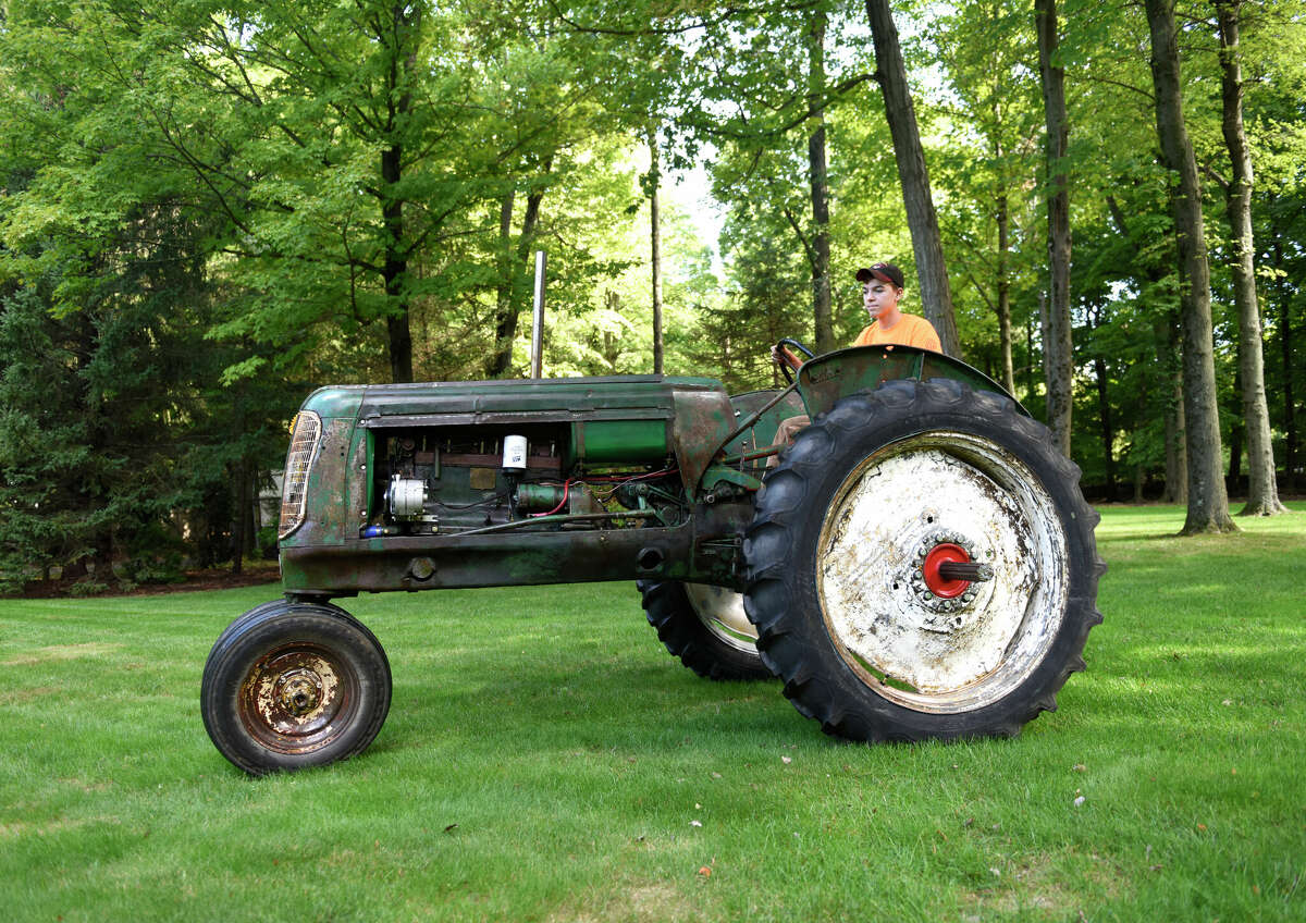 Greenwich teen's love to fix tractors made him a TikTok star