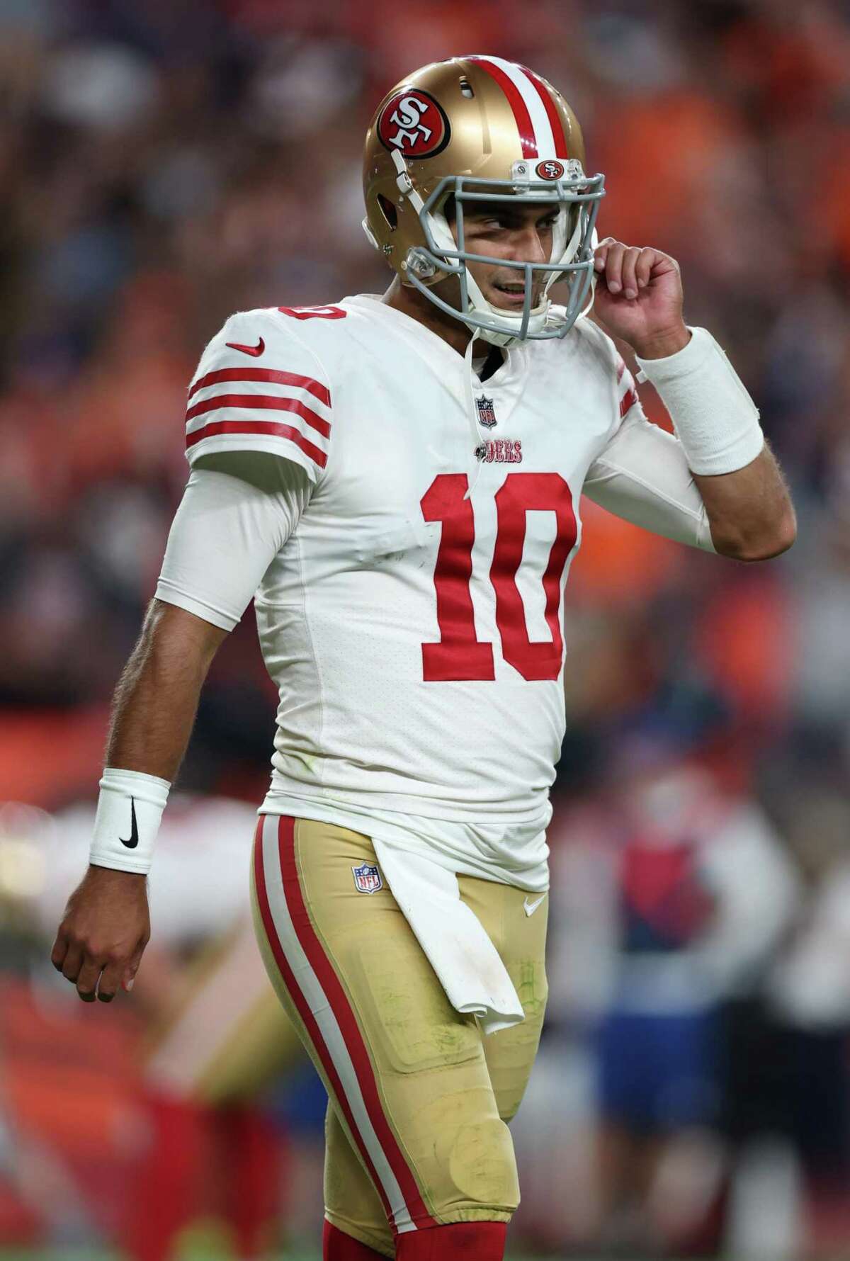 DENVER, COLORADO - SEPTEMBER 25: Jimmy Garoppolo #10 of the San Francisco 49ers reacts after giving up a safety during the third quarter against the Denver Broncos at Empower Field At Mile High on September 25, 2022 in Denver, Colorado. (Photo by Matthew Stockman/Getty Images)