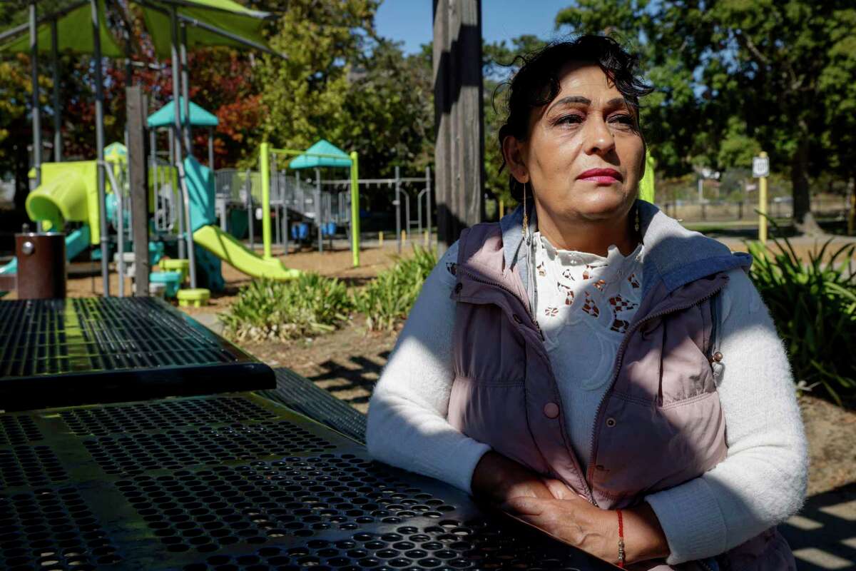 Ana Nuñez sits at a playground where her granddaughter plays at Pickleweed Park near Albert J. Boro Community Center in San Rafael, Calif. on Tuesday, Sept. 27, 2022. Nuñez is one of many residents of San Rafael’s Canal neighborhood outraged by the violent arrest of a man by San Rafael police. Police footage shows officers taking the man to the ground while one punches him in the face, bloodying his nose.