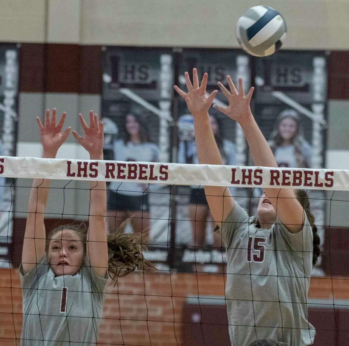 Legacy High's Kylee Radwanski and Sarah Philley go up for a block against Permian 09/27/2022 at Legacy High gym. Tim Fischer/Reporter-Telegram