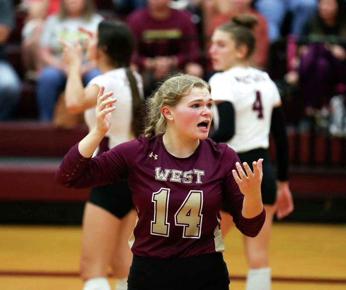 Magnolia West's Kassidy Johnson (14) looks for a call in the second set of a District 21-5A high school volleyball match at Magnolia West High School, Tuesday, Sept. 27, 2022, in Magnolia.