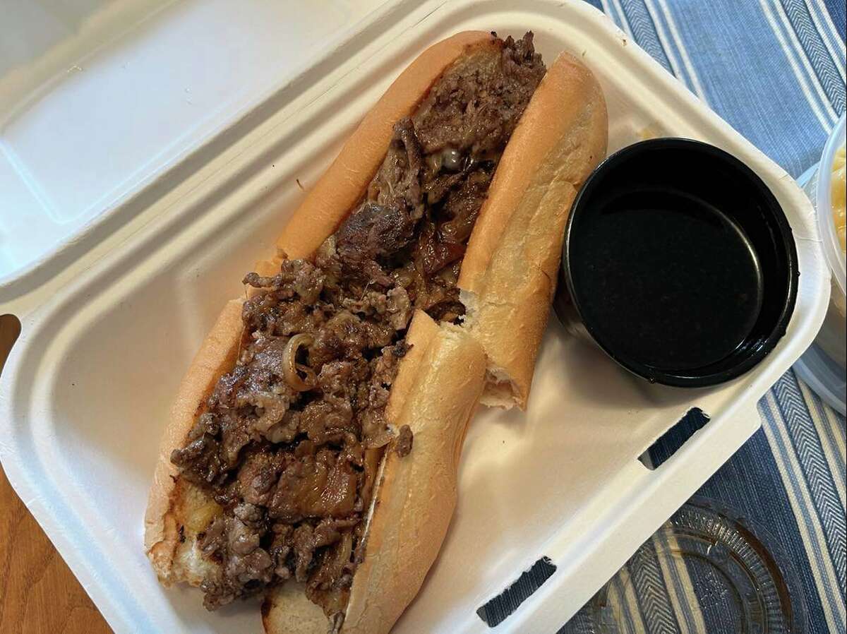 Flying Trout Catering's French dip au jus includes tender shaved beef, grilled onions and a side of jus. The portion is big enough to be split into two meals.