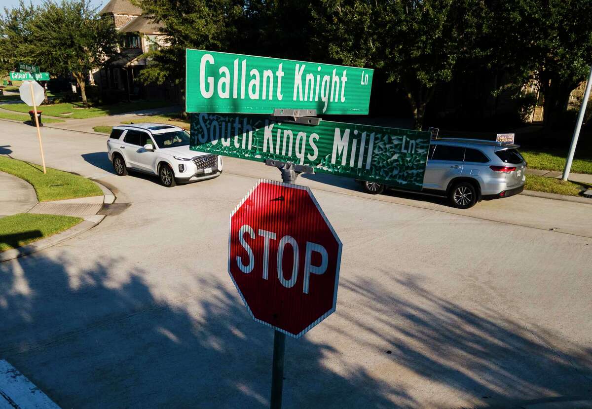 Vehicles pass through the Kingwood intersection of Gallant Knight Lane and South Kings Mill Lane on Sept. 28, two days after an eight-year-old boy was was killed after being hit by an SUV while riding his bike.