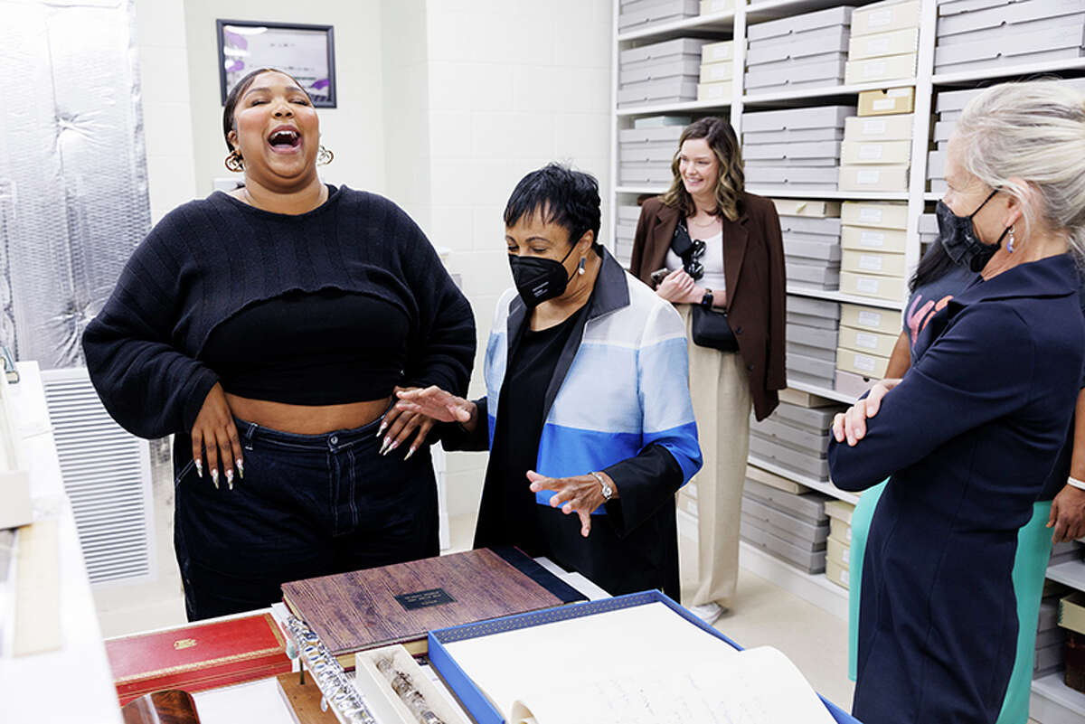 Lizzo with Librarian of Congress Carla Hayden in the Library's flute vault.