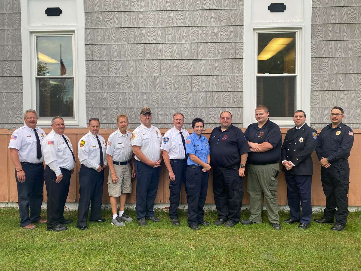 The Manistee County Fire Fighters Association members stand for a photo ahead of National Fire Prevention Month which starts Oct. 1.