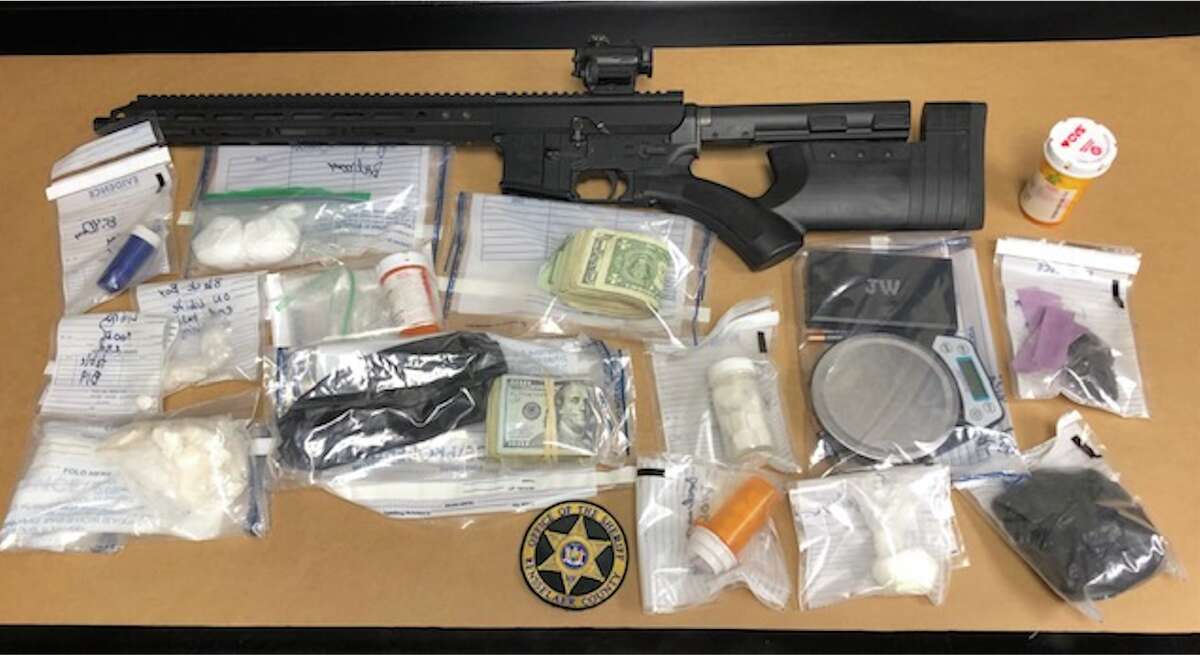 The Rensselaer County Sheriff's Office seized drugs, weapons and cash while executing a search warrant at a 118th Street residence on Sept. 27, 2022.
