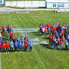 Students at Triopia wore red and blue in a show of support for Jayden Veesenmeyer, a Pleasant Plains High School senior who collapsed during a game Saturday.