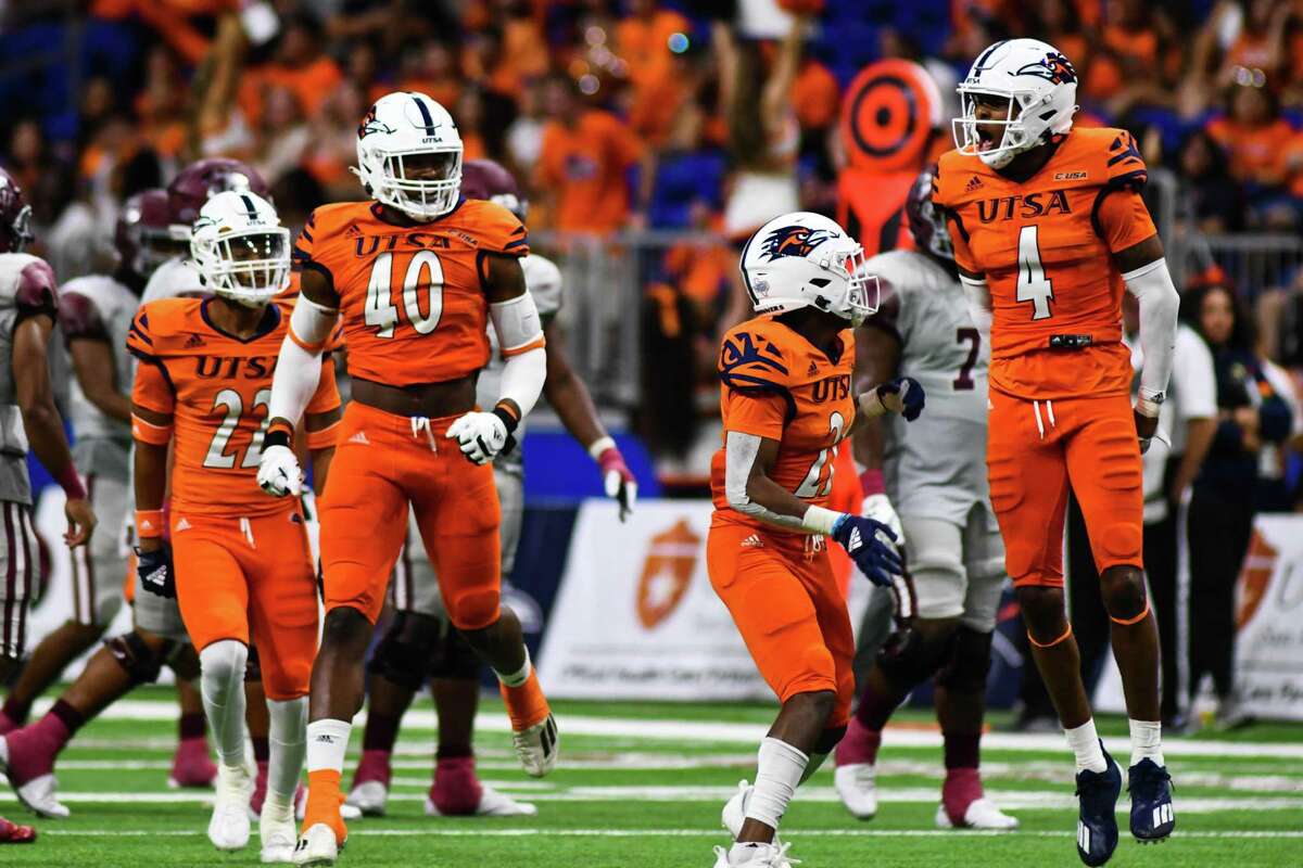 UTSA safety Clifford Chattman celebrates with teammates after stopping Texas Southern short on fourth down during the fourth quarter of Saturday’s game at the Alamodome.
