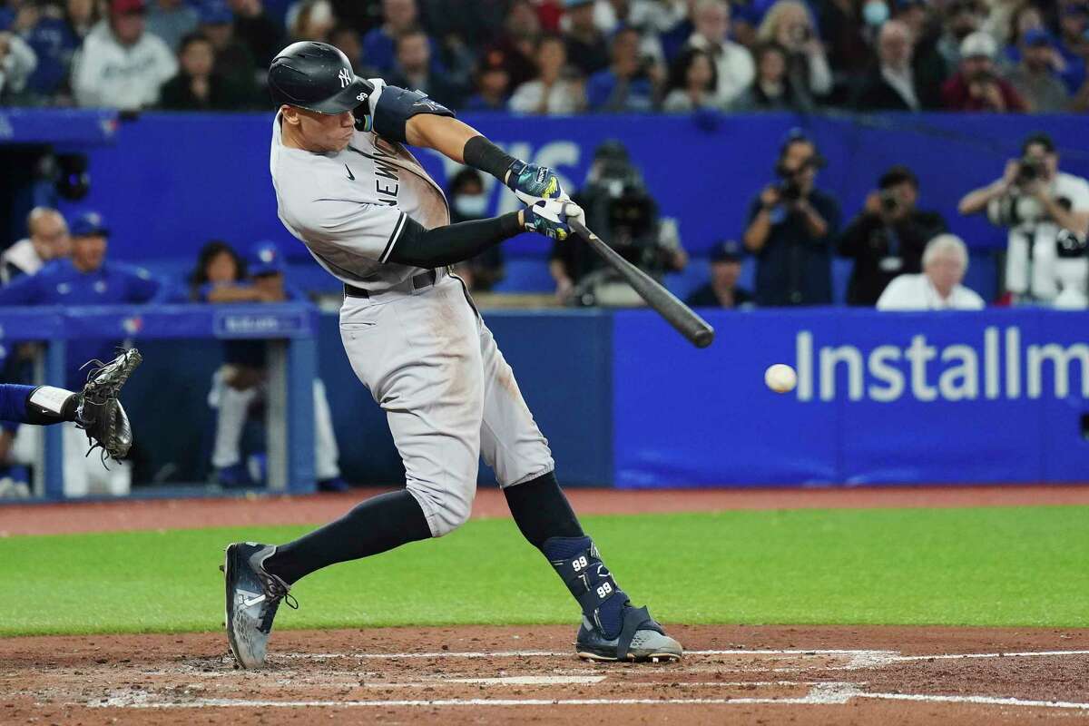 New York Yankees' Aaron Judge grounds out against the Toronto Blue Jays during the fourth inning of a baseball game Wednesday, Sept. 28, 2022, in Toronto. (Nathan Denette/The Canadian Press via AP)
