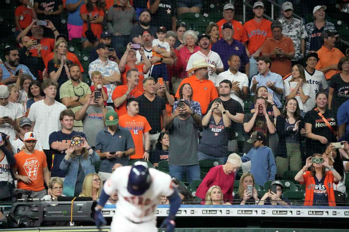 Fans on their feet as Houston Astros Jose Altuve comes in to pinch hit with the bases loaded during the ninth inning of an MLB baseball game at Minute Maid Park on Wednesday, Sept. 28, 2022 in Houston.