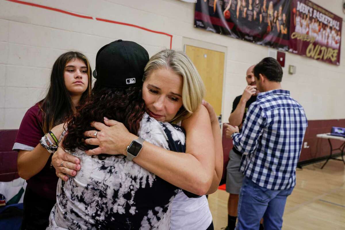 Laura Didier embraces freshman Kyanna Alves, 14, after an assembly at Whitney High School in Rocklin (Placer County) bringing awareness to the fentanyl crisis that killed Didier’s son, Zach. Kyanna survived her own overdose.
