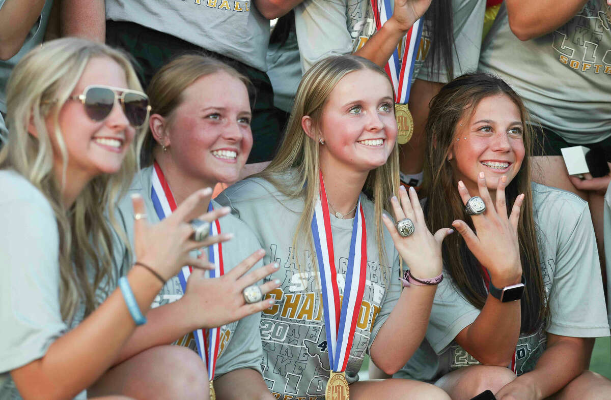 Lake Creek High School softball players show off their undefeated Class 5A state championship rings during the school's homecoming pep rally, Wednesday, Sept. 28, 2022, in Montgomery.