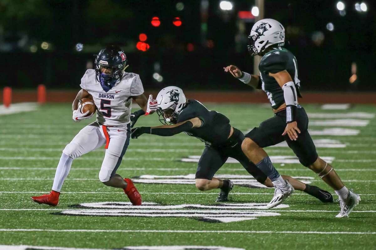 Dawson RB Bryce Burgess (5) hopes to find running room Friday night in the Eagles' District 23-6A football game against Alief Taylor at Pearland Stadium.