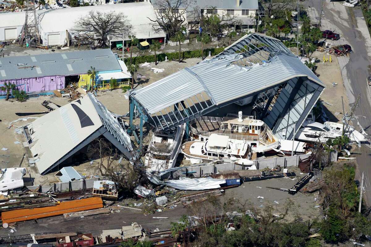 This aerial photo shows damaged boats and structures after Hurricane Ian on Thursday, September 29, 2022 in Fort Myers, Florida.