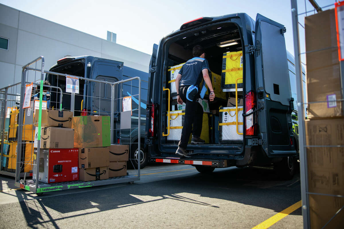 An Amazon photo of a delivery van prepping for the rounds. On Sept. 28 the company announced it had raised its average hourly rate for new employees to $19, well above the $15 minimum wage Connecticut is adopting in 2023. (File press photo via Amazon)