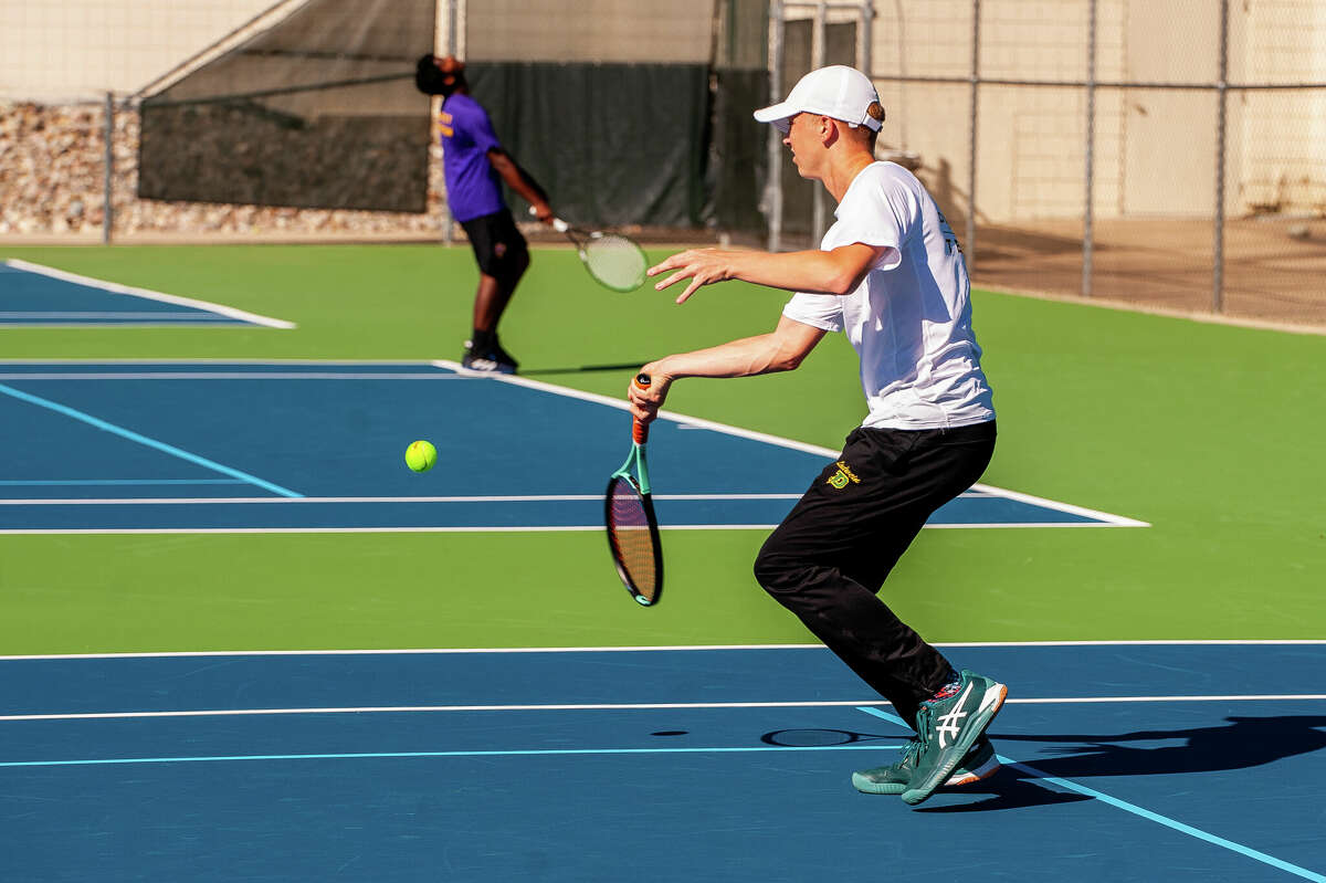 PHOTOS Dow and Midland high tennis teams compete in Saginaw Valley