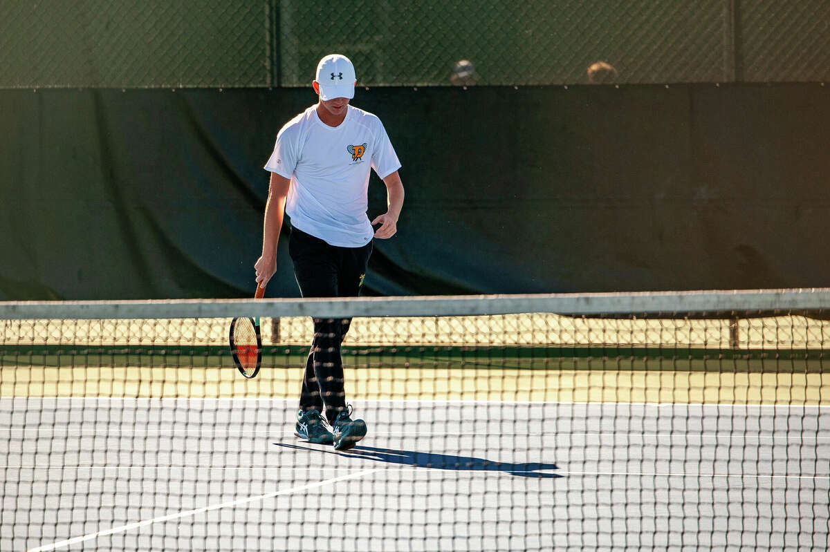 PHOTOS Dow and Midland high tennis teams compete in Saginaw Valley