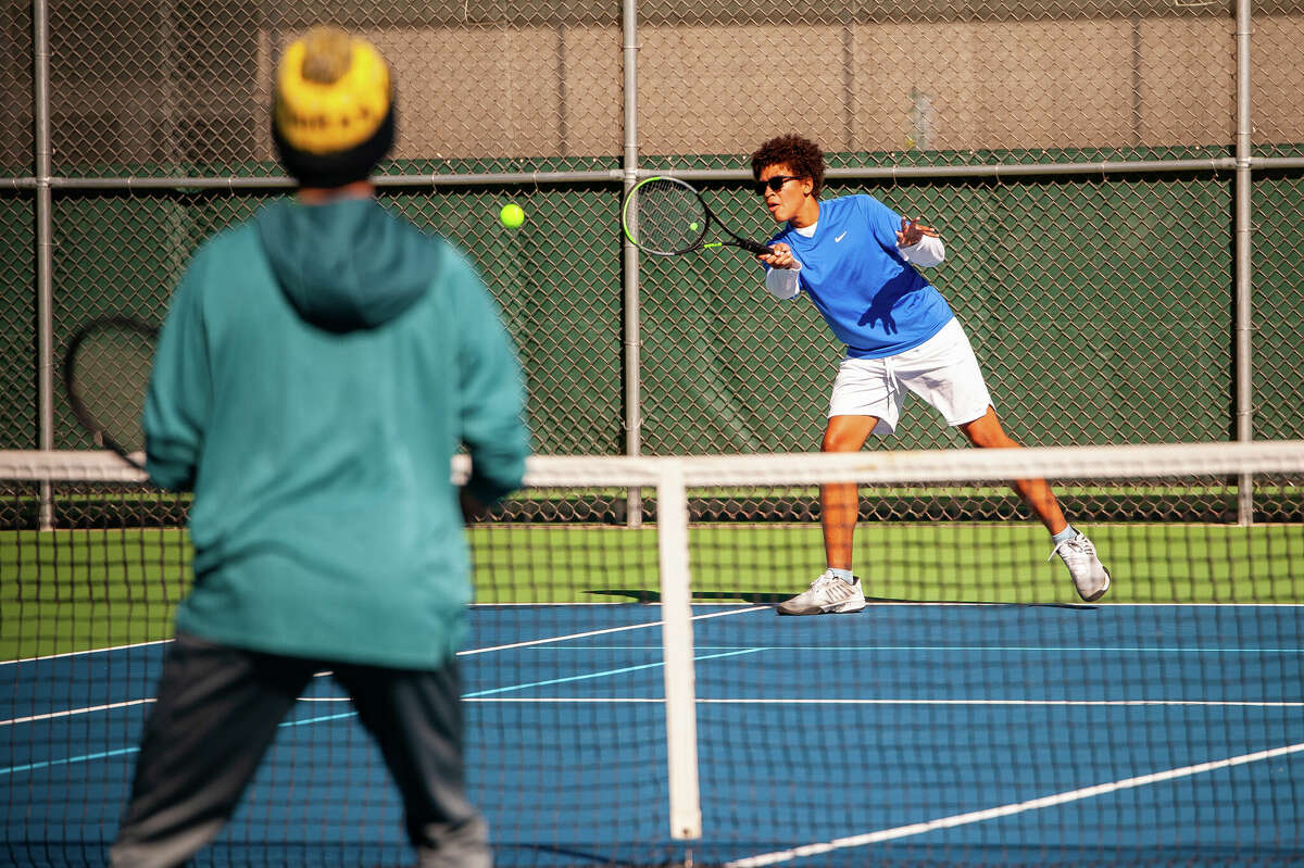 PHOTOS Dow and Midland high tennis teams compete in Saginaw Valley