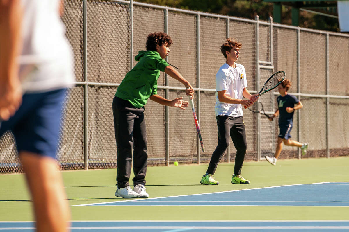PHOTOS Dow and Midland high tennis teams compete in Saginaw Valley