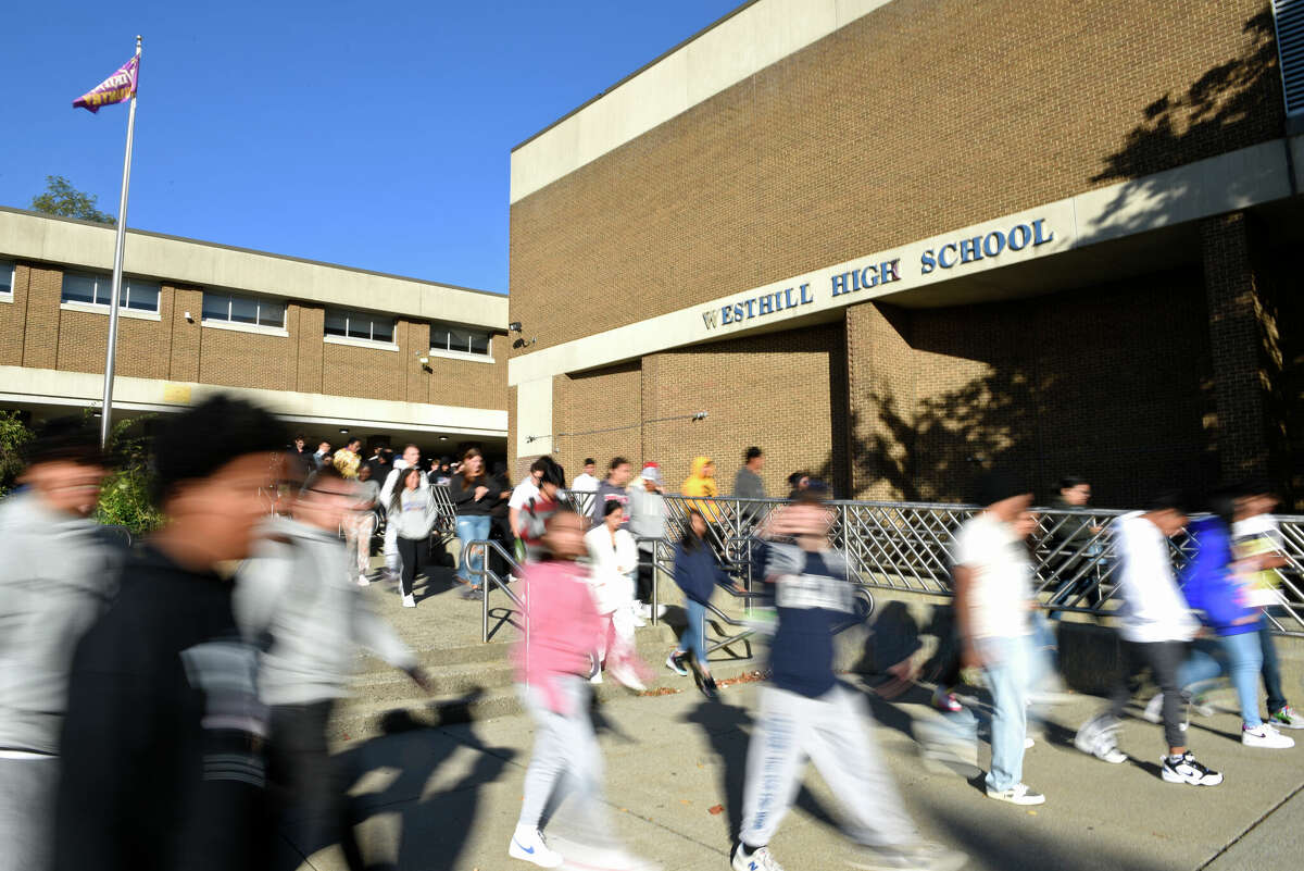 Students are dismissed from Westhill High School in Stamford, Conn. Thursday, Sept. 29, 2022.