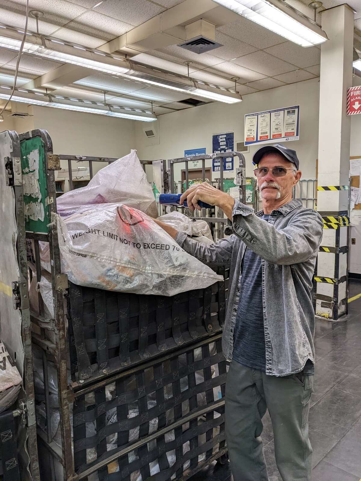 New Milford man retires after working in post office for 48 years