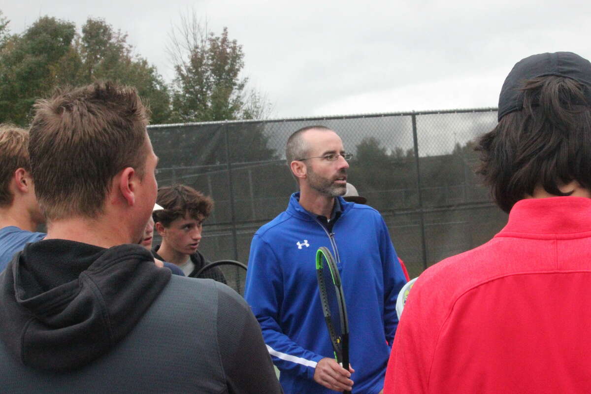 Big Rapids tennis coach Jon Coles talks to his players during Wednesday's clinic at Ferris State.
