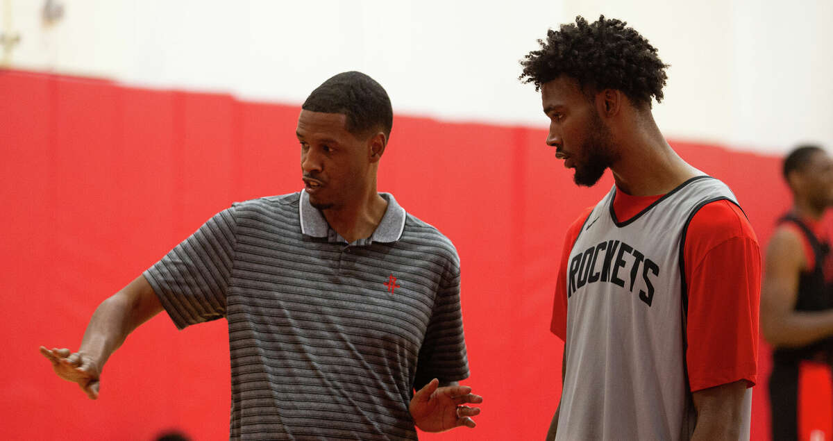Houston Rockets Head Coach Stephen Silas talks to draftee Tari Eason after a Summer League practice Tuesday, July 5, 2022, at Toyota Center in Houston.