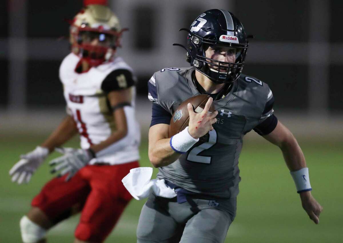 College Park quarterback Conner Dunphy (2) runs the ball for a first down in the second quarter of a District 13-6A high school football game at Woodforest Bank Stadium, Thursday, Sept. 29, 2022, in Shenandoah.