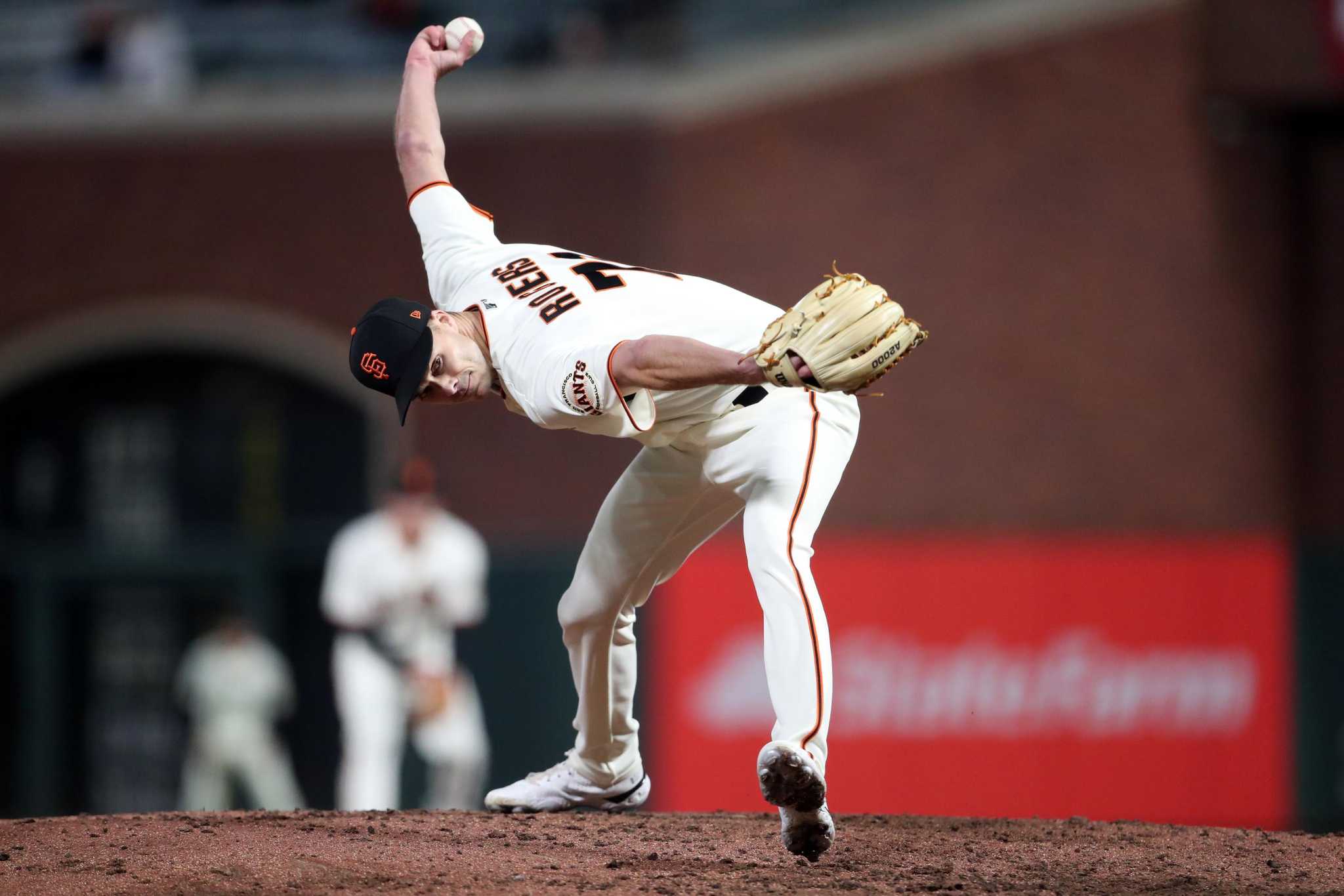 Why Giants reliever Tyler Rogers wears those A's-reminiscent white