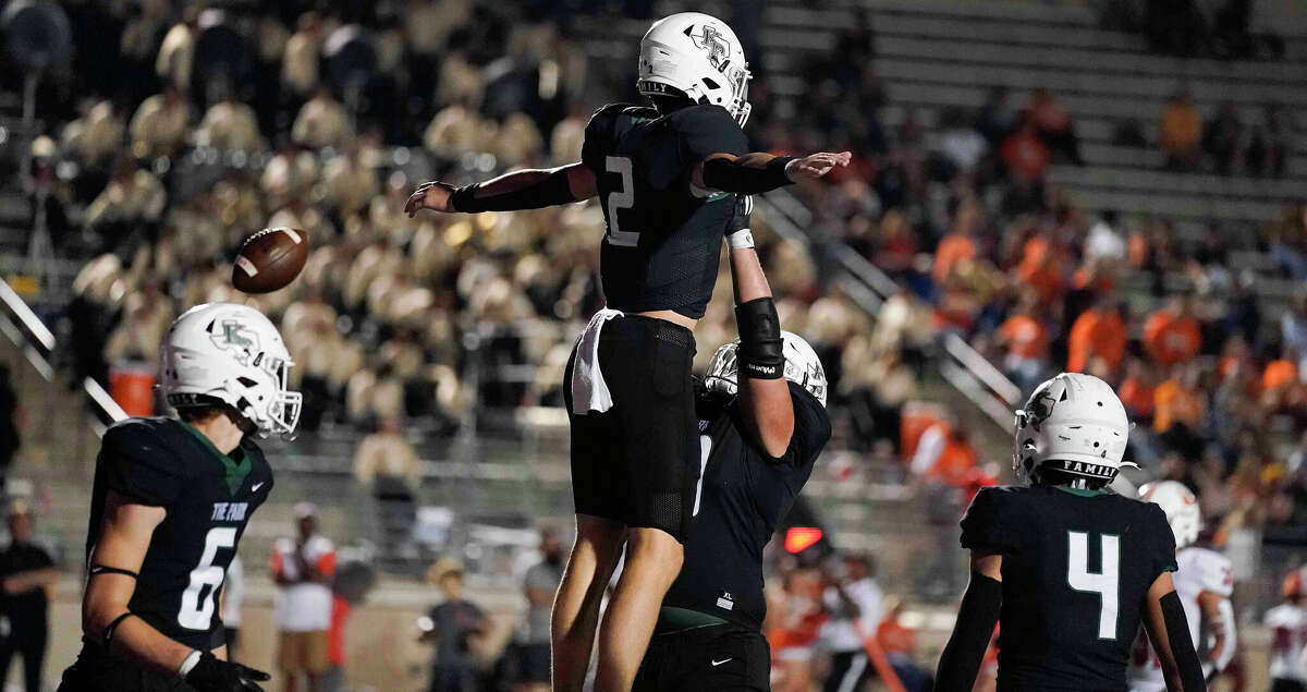 Kingwood Park quarterback Patrick Overmyer (2) celebrates his touchdown with Tucker Lee during the second half of a high school football game against La Porte, Thursday, Sept. 29, 2022, in Humble, TX.