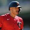 Minnesota Twins' Carlos Correa reacts while batting during the first inning of a baseball game against the Chicago White Sox, Thursday, Sept. 29, 2022, in Minneapolis. (AP Photo/Abbie Parr)