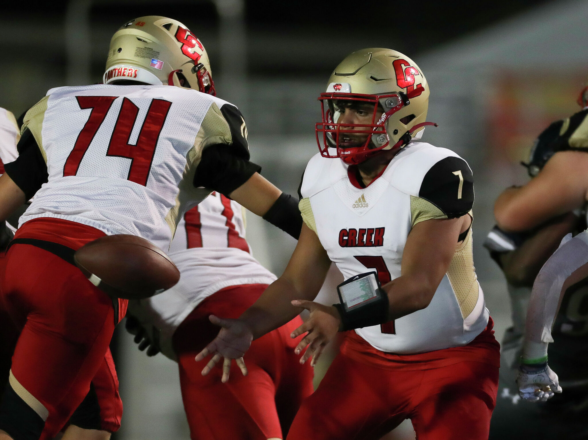 AI has unusual take on area prep football helmets