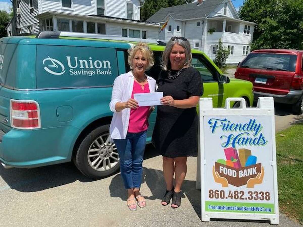 As part of its annual grant program, the Union Savings Bank Foundation (USBF) awarded 16 local food banks with $6,000 each in funding. Friendly Hands Food Bank, Torrington, was among the recipients. Pictured during a recent check presentation are Michele Bonvicini, USBF Executive Director and Karen Thomas, Friendly Hands Food Bank, Executive Director.