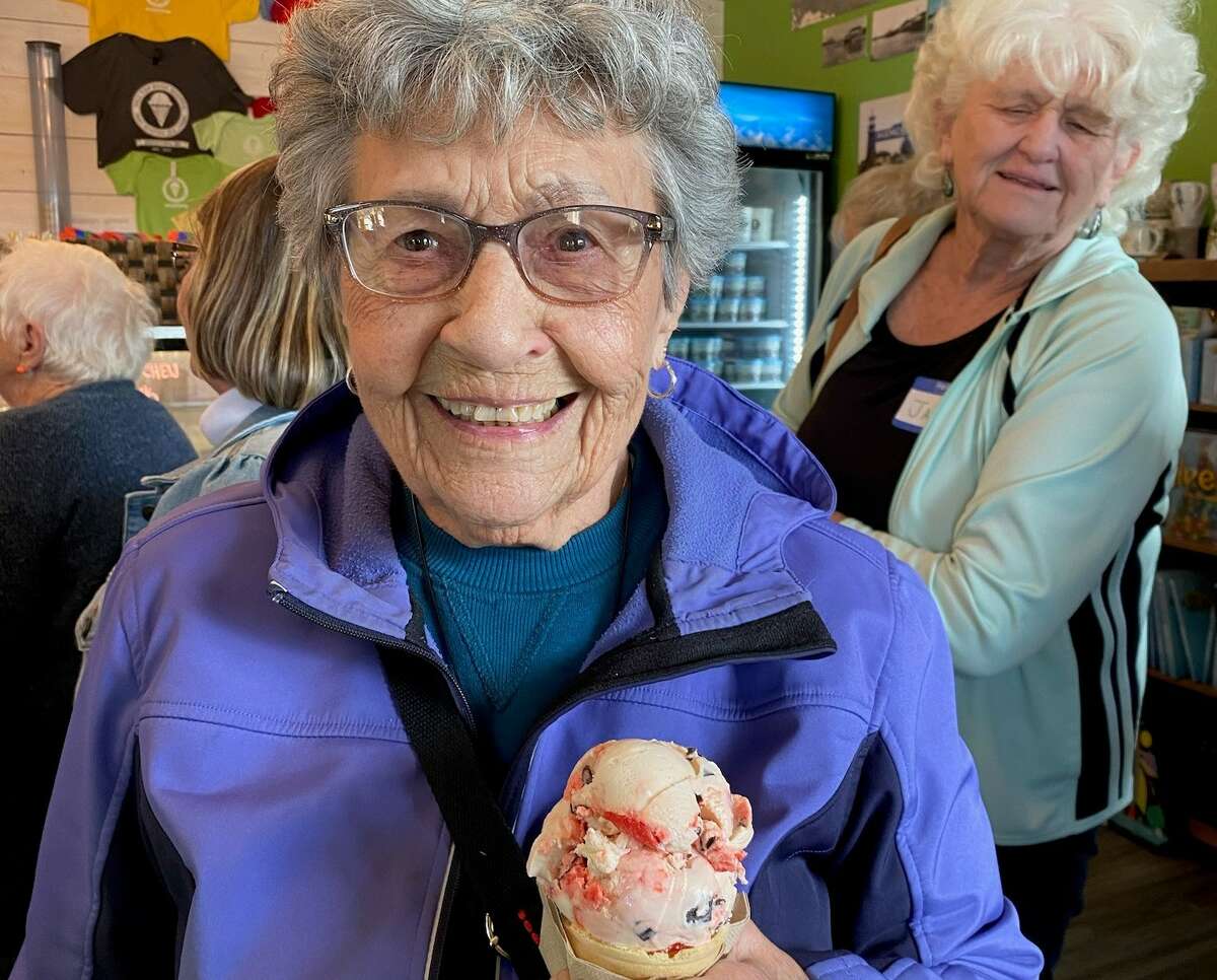 Older residents enjoy an obligatory stop for ice cream during the last Mystery Trip of the season. 