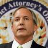 FILE - In this June 22, 2017 file photo, Texas Attorney General Ken Paxton speaks at a news conference in Dallas. As Paxton seeks to fend off legal troubles and win a third term as Texas' top law enforcement official, his agency has come unmoored by disarray behind the scenes, with seasoned lawyers quitting over practices they say aim to slant legal work, reward loyalists and drum out dissent.