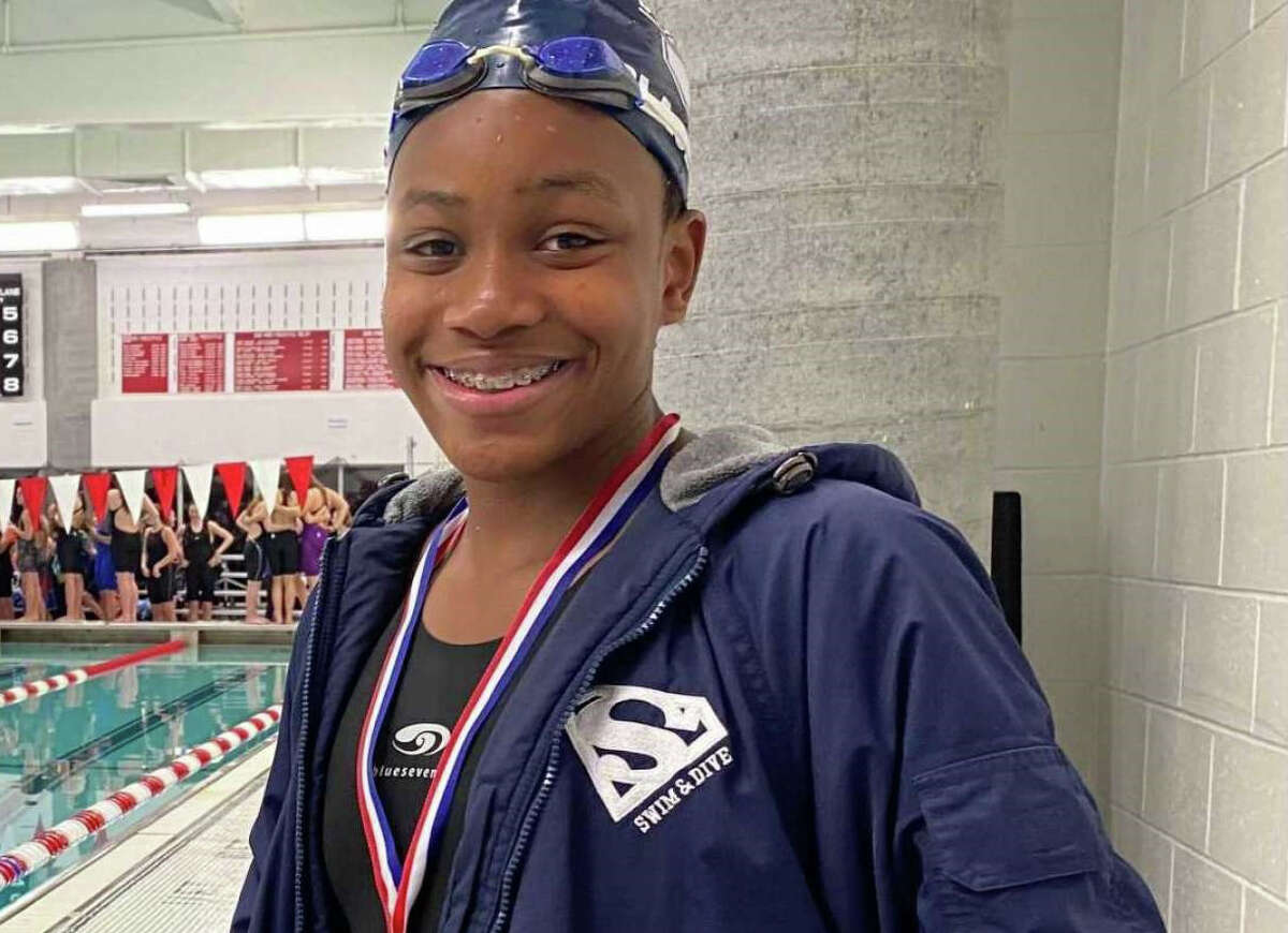 Staples freshman Annam Olasewere broke state records in the 50 and 100 freestyles.