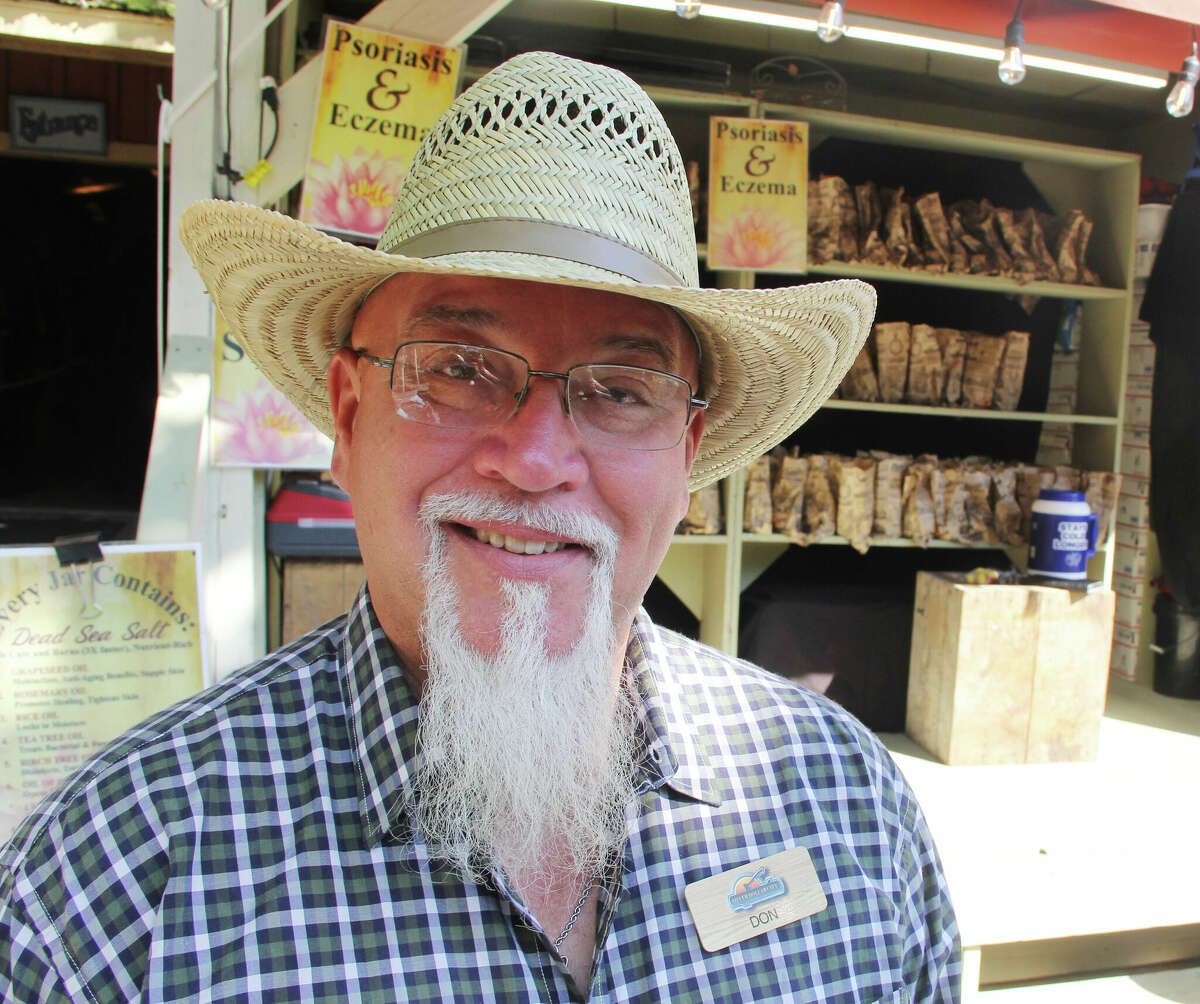Troy resident Don Coppedge, who sells a Dead Sea salt scrub under the name Don Moondance, mans a booth during the Harvest Festival at Silver Dollar City in Branson. Coppedge has been participating in the festival, which runs through Oct. 29, for about 10 years.
