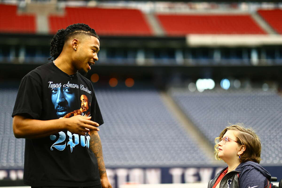 Texans rookie John Metchie III giving an NRG Stadium tour to people he bonded with in the hospital as he's battled cancer on Monday, Sept. 26, 2022.