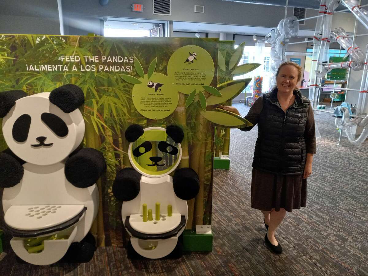 KidsPlay Children's Museum, located on Main Street across from the Warner Theatre, was recently chosen to host a Freeman Foundation Asian Culture Exhibit, providing learning opportunities about South Korea, China and Japan. The new exhibits highlight different cultural elements from each country. Executive Director Eileen Marriott shows the panda exhibit. 
