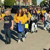 Handfuls of candy flew in the early autumn sunshine as Bad Axe residents descended on Main Street for the Hatchets’ 2022 homecoming parade late Friday afternoon. The procession featuring the homecoming court candidates, Hatchet marching band, cheerleading squad, emergency vehicles and Bad Axe Public Schools students headed west through downtown toward the campus for Friday night's football game against Vassar.