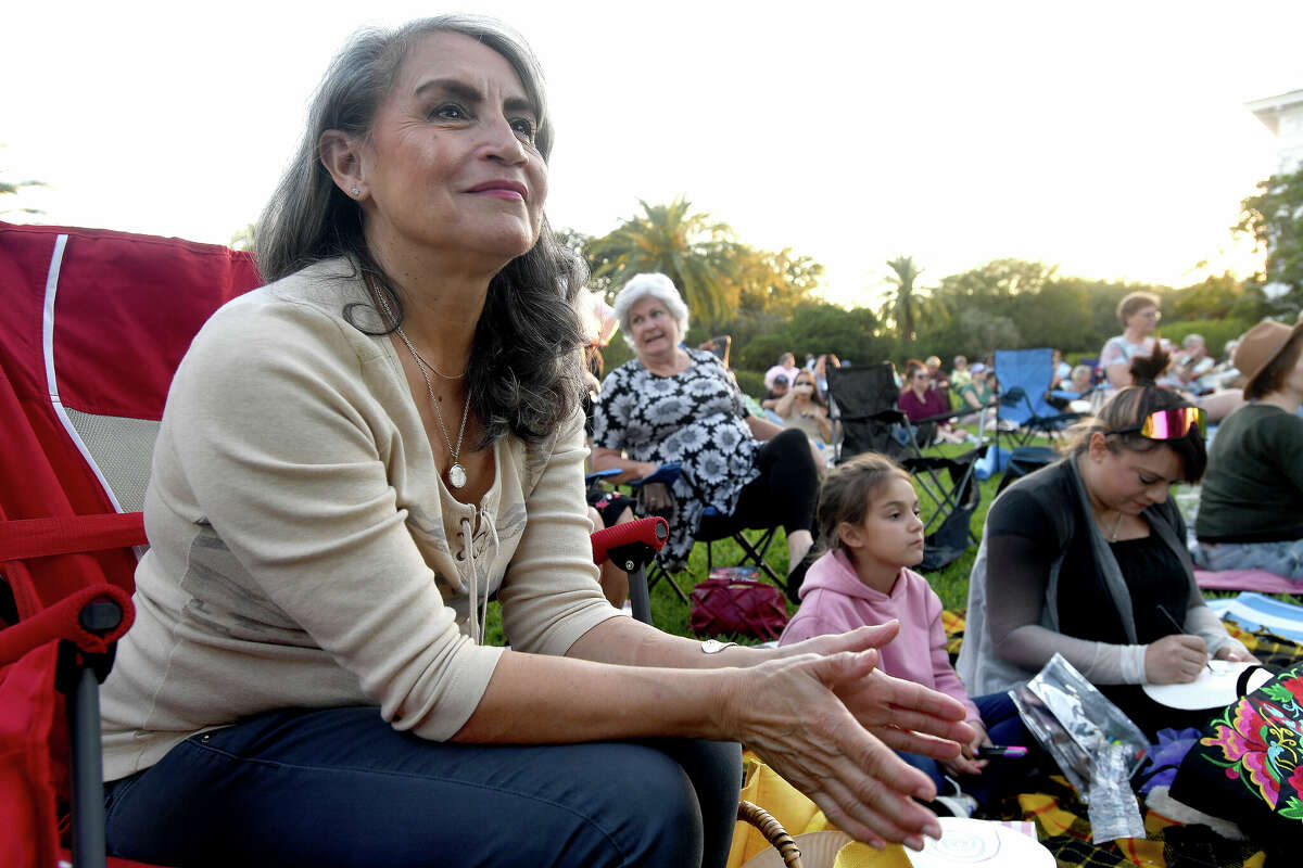 Magda Villarreal takes in the Jazz and Juleps event on the lawn at the McFaddin-Ward House Museum Thursday. Photo made Thursday, September 29, 2022 Kim Brent/Beaumont Enterprise