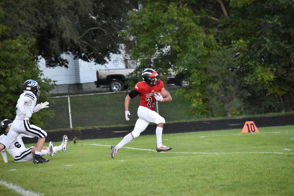 Bryson Hughes score on the ground, through the air, and even on a kickoff return in a 62-17 win over Newaygo.