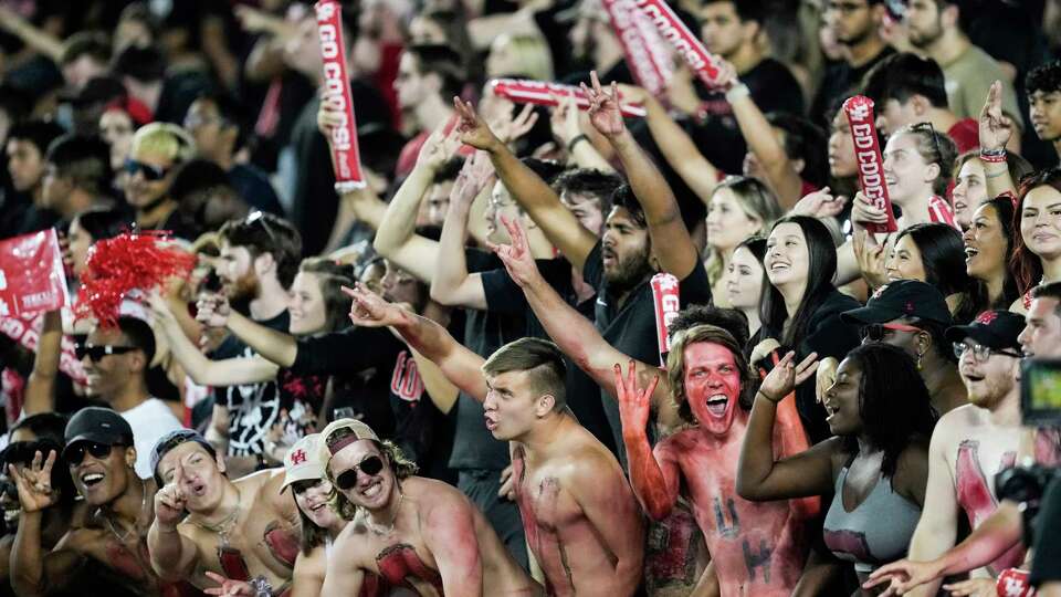 Houston fans cheer during the second half of an NCAA college football game against Tulane Friday, Sept. 30, 2022, in Houston.