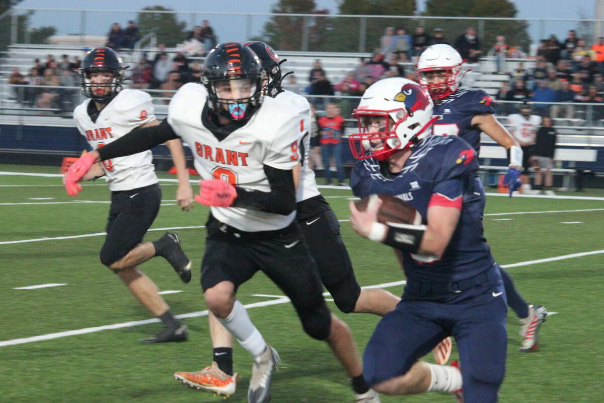 Big Rapids' Will Strickler tries to avoid Grant tacklers.