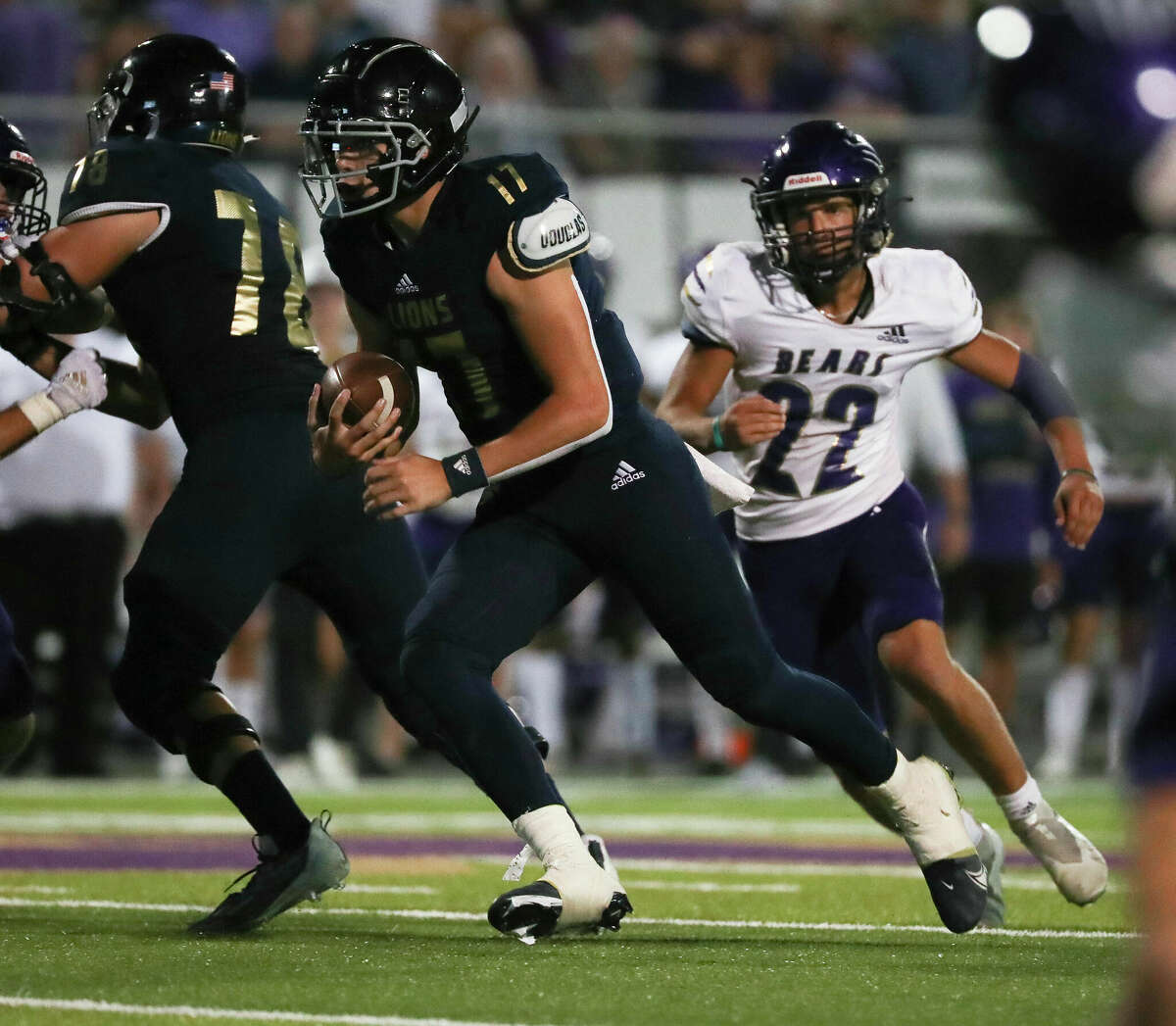 Lake Creek quarterback Cade Tessier (17) runs for a 10-yard touchdown in the second quarter of a District 10-5A (Div. II) high school football game at Montgomery ISD Stadium, Friday, Sept. 30, 2022, in Montgomery.