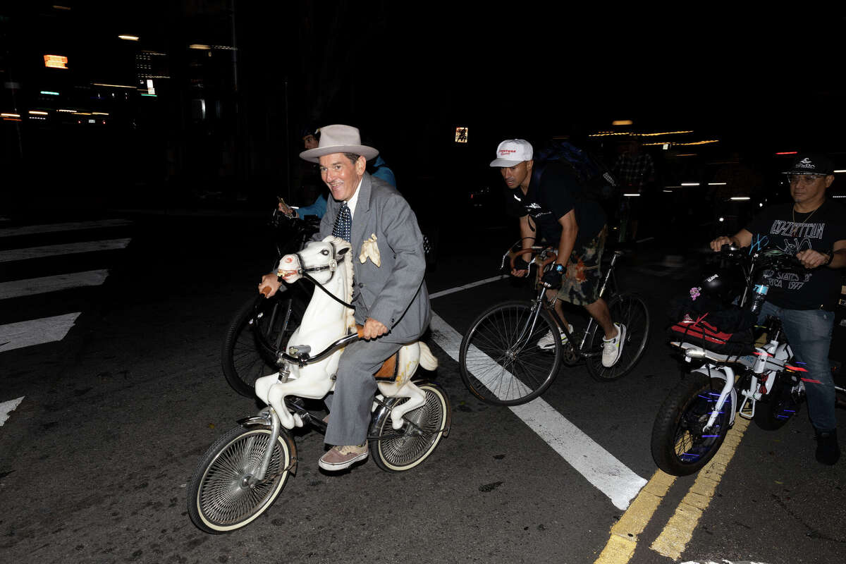 Critical Mass riders on Columbus Avenue on September 30, 2022, including Slimm Buick in front left.
